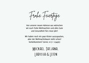 Umzugs-Weihnachtskarte mit Lichterkette um Kartons 3