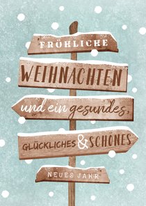 Geschäftliche Weihnachtskarte Schnee und Wegweiser