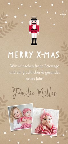 Weihnachtskarte mit großem Nussknacker und Zweigen Rückseite