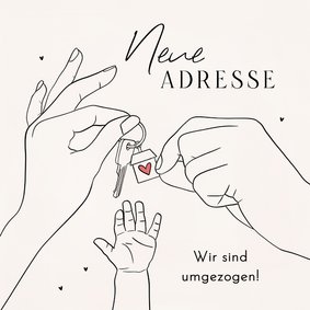 Umzugskarte Hausschlüssel mit Babyhand