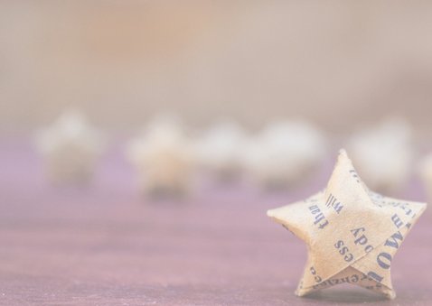 FairTrade Weihnachtskarte gefalteter Papierstern Rückseite