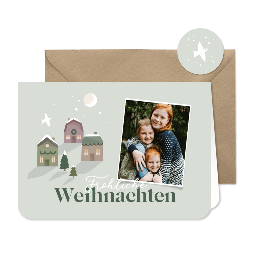 Weihnachtskarte mit Foto und Weihnachtshäusern - Karteneindruck
