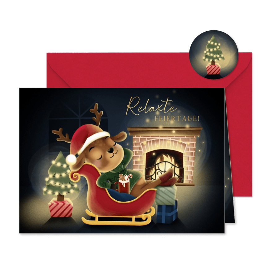 Weihnachtskarte Rentier im Schlitten vor Kamin - Kartenvorschau