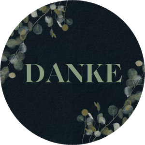Dunkler Dekosticker mit grünem 'DANKE' und Eukalyptuszweigen.