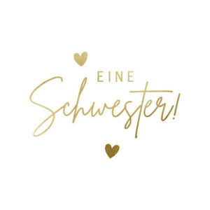 Weißer Aufkleber mit Schrift 'Eine Schwester!' in Goldoptik