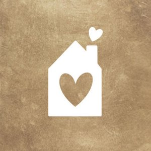 Aufkleber mit weißem Haus auf Hintergrund in Goldoptik
